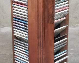 371 Group of CDs on wood swivel rack