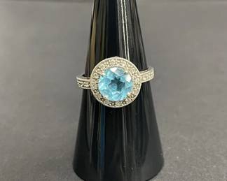 533h Sterling silver ring with blue topaz and clear