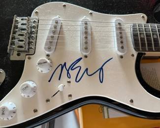 This is Spinal Tap autographed guitar.