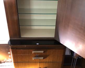 Medical cabinet open with glass shelves