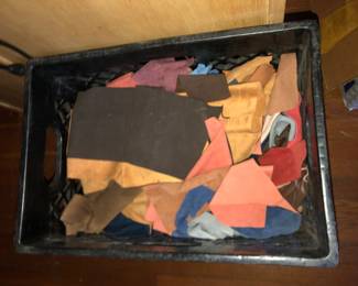 Many boxes of scrap suede & leather etc