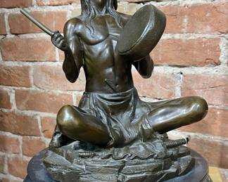 BRONZE SCULPTURE OF SEATED NATIVE AMERICAN DRUMMER ON MARBLE BASE
