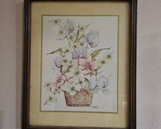 A vintage framed floral arrangement print signed by the artist Casey.