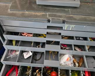 Box filled with fishing lures