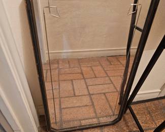 This is a vintage 1980s decorative wall mirror with an etched glass panel and carved wooden frame.