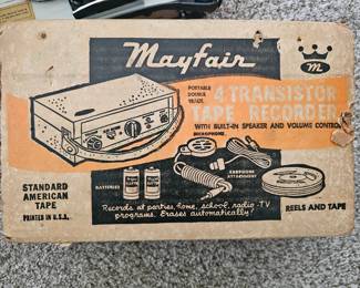A vintage cardboard box for a Mayfair 4-transistor reel-to-reel tape recorder