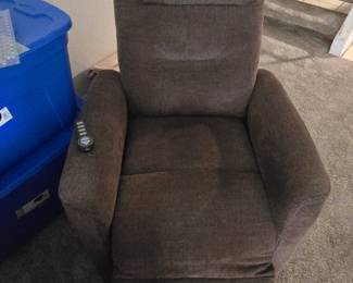 Brown Power Recliner / Lift Chair with Remote — Great ConditionSelling a super comfortable power electric recliner in a plush mocha brown fabric. Extremely supportive headrest and lumbar padding. Perfect for a living room, home theater, or anyone needing assistance standing up easily.Features: Fully electric. Includes a wired remote control to smoothly adjust the recline and footrest positions . Heat and massage at the push of a button.Condition: Clean and fully functional! Motors run smooth and quiet. No rips or tears in the fabric. Kept in a smoke-free home. Pickup:Please bring a truck/van and a friend to help load it, as the base is heavy due to the electric motor mechanism!l