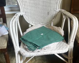 Wicker chair and linens