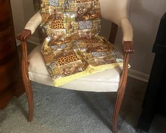 Leather and wood chair with animal blanket