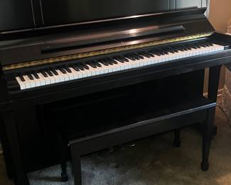 Steinway ebony upright piano