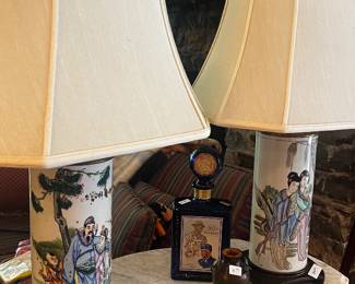Tall lamps with Chinese motifs, marble top turtle table.
