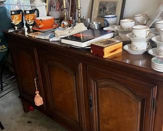 Solid sideboard/ buffet with shelves and pull out drawers. 