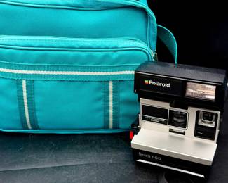 vintage Polaroid Spirit 600 instant film camera with the Light Management System