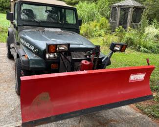 ‘94 Jeep Wrangler with plow attachment 