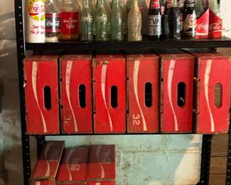 Collection of Vintage Coca-Cola Wooden Crates and Assorted Bottles