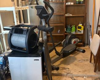 (fan not for sale) Bookshelf- Elliptical machine - mini fridge