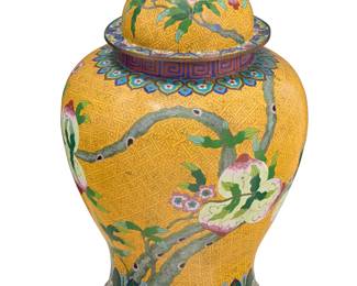 3348 A Chinese cloisonné ginger jar 20th century Enameled copper, depicting floral motifs on a yellow ground Unmarked Height 21 in., diameter 13 1/2 in. Estimate: $300 - $500