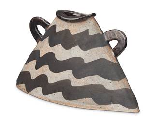 3009 Kazuko Matthews (b. 1934) A glazed studio pottery vase, late 20th/early 21st century With incised signature: Kazuko Matthews Height 7 1/8 in., width 12 1/8 in., depth 3 1/2 in. Estimate: $200 - $300