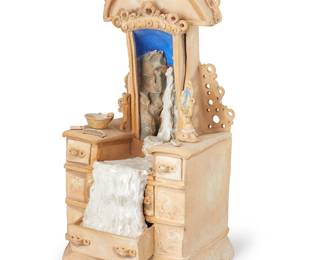3237 Robert Richards (20th Century) A studio ceramic sculpture of a vanity, 1975 Partially glazed slab-built ceramic Incised signature and date: Robert Height 23 1/2 in., width 11 1/2 in., depth 11 1/4 in. Estimate: $400 - $600