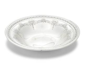 3003 A Towle sterling silver bowl Early/mid-20th century With factory mark for sterling and numbered: 52380 Height 2 1/2 in., diameter 10 in. 13.6 oz. troy approximately Estimate: $800 - $1,200