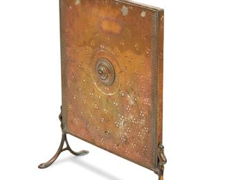 3402 A Victorian repoussé and hammered metal fire screen Late 19th/early 20th century With rectangular copper panel and brass ring handle and splayed feet Height 27 1/4 in., 19 1/2 in., depth 8 in. Estimate: $300 - $400