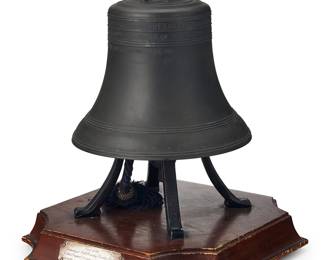 3017 A Whitechapel Bell Foundry bronze Bicentennial Liberty Bell 1974 The replica bell mounted on a wood plinth Impressed to top of bell: 1491; with personalized inscriptions to two metal plaques applied to plinth Height of bell 9 1/4 in.; overall height 15 1/2 in., width 13 in., depth 12 3/4 in. Estimate: $300 - $500