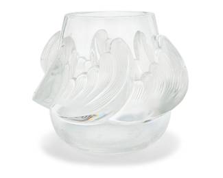 3259 A Lalique glass 'Vagues' vase Late 20th/early 21st century Originally designed 1935 Etched: Lalique ® France Height 8 3/4 in., diameter 10 3/8 in. Estimate: $600 - $800
