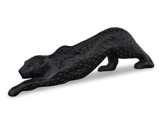 3298 A Lalique black glass 'Zeila' panther Late 20th century Designed 1989 by Marie-Claude Lalique (1935-2003) Etched: Lalique ® France; with applied factory label Height 4 1/4 in., length 14 3/4 in., width 2 3/4 in. Estimate: $700 - $900