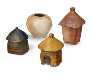 3139 Mary Law (b. 1947) Four studio pottery items, late 20th/early 21st century Comprising a beige vase with swirl design and three lidded house-form vessels Each impressed with potter's chop mark 4 pieces Height of vase 7 1/8 in., diameter 7 7/8 in.; height of tallest house 10 3/8 in., width 6 3/4 in., depth 6 3/4 in. Estimate: $500 - $700