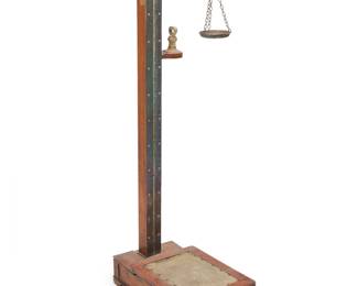 3288 A W. & T. Avery Ltd. brass and steel scale Late 19th/early 20th century With 2 lb. counterweight, on a wood base Marked to upper arm: W & J Avery Ltd. / Birmingham Height 54 in., width 18 in., depth 23 in. approximately Estimate: $400 - $600