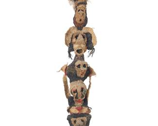 3037 20th/21st Century American School A figural woven assemblage Yarn, feathers, mixed media, in acrylic display case Unmarked Height of object 14 in., width 2 7/8 in., depth 2 in.; height of acrylic 18 in., width 8 1/2 in., depth 4 in. Estimate: $600 - $800