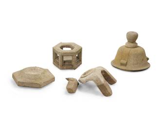 3399 A Japanese stone ishi doro garden lantern 20th century The rounded jewel above shaped umbrella and a hexagonal fire box, raised on a four-legged base 4 pieces Height of umbrella 19 in., diameter 19 1/2 in.; height overall 40 in. approximately Estimate: $300 - $500