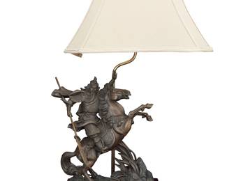 3333 A Chinese bronze of the warrior god Guan Yu mounted as a lamp 20th century The figure mounted on a wood base issuing a brass standard and single light surmounted by a fabric shade, electrified Unmarked Height 30 in., width 12 1/2 in., depth 8 1/2 in. Estimate: $300 - $500