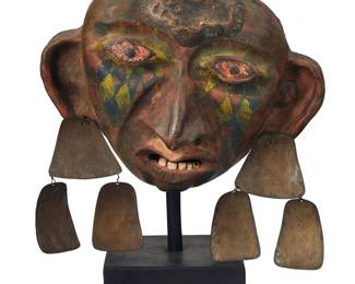3016 Radu Flip Radu (20th Century) Untitled head, late 20th century Painted formed pottery and mixed metal on enameled metal stand Unsigned Height of head with ear adornments 10 in., width 13 in., depth 7 in.; Height of stand 14 in., width 6 in., depth 6 in. Estimate: $300 - $500