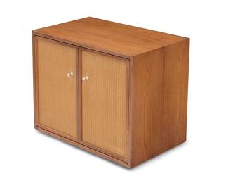 3018 A Modern teak and cane cabinet Late 20th/early 21st century The doors with caning to front, opening to reveal a single adjustable shelf Stamped to underside: 21-25A Height 22 in., width 26 1/2 in., depth 17 in. Estimate: $400 - $600