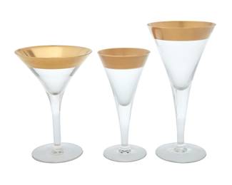 3390 Dorothy Thorpe (1901-1989) A glass 'Golden Band' stemware service, mid-20th century Comprising: 12 water glasses (7 5/8 in.) 12 wine glasses (6 1/8 in.) 6 martini glasses (6 1/4 in.) Each unmarked 30 pieces Estimate: $300 - $500
