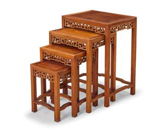 3256 A nest of four Chinese carved wood tables Late 20th century Each with openwork apron depicting cloud motifs 4 pieces Largest height 26 in., width 19 in., depth 14 1/8 in.; height of smallest 15 in. Estimate: $300 - $500