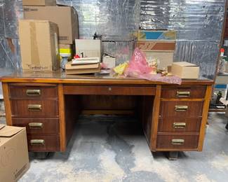 Big, solid wood desk. Must haul