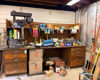 Work bench with rolling drawers, must dismantle and haul 9 feet long. 20 electrical outlets built in!