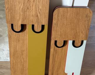 Handmade Wood Decor (Pair) — handmade wood wall art with pops of color. Tall piece: 25.5” high x 8” wide. Short piece: 21.5” high x 8” wide.