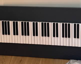 Handcrafted_Piano_Wood_Art.jpg Handcrafted Piano Wood Art — piano-keys wood wall art, 48” wide x 15” tall. Fun statement piece for a music room or hallway.