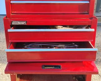 Red Rolling Tool Shop Tool Chest and Cabinet with a Variety of Tools