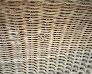 Vintage wicker sectional with coffee table and chair with ottoman. See following picture for chair/ottoman photo. Comes with throw pillows. Very clean and is in good vintage condition. Wicker has broken pieces in back side. More photos for condition available upon request. H- 28. W-34. L- 100 x 100. Coffee table - 32 1/4 square. H- 16 3/4. Chair with ottoman - W- 39 1/4. Seat depth - 22. Price - $580.00