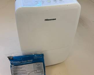 Hisense 35 PNT dehumidifier with drain hose. Price - $50.00