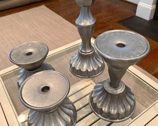 Pottery Barn set of 4 silver candlesticks. 16", 10 1/2", (2) 6 1/2". Price - $28.00