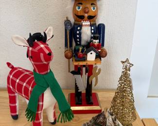 Christmas set. Includes Nutcracker - H-20", reindeer, tree and birdhouse. Price - $18.00