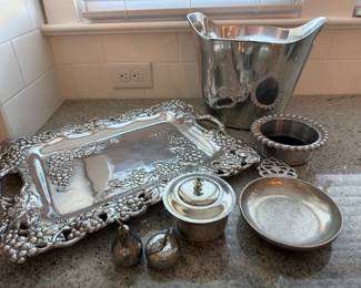 6 piece silver set. Steiff bowl with lid, Arthur court grapevine platter, salt/pepper shakers, champagne bucket, wine coaster. Price - $24.00