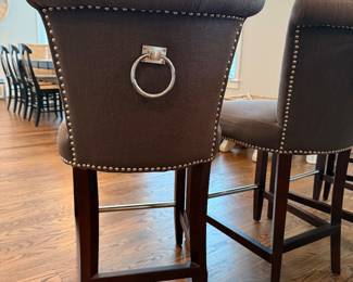 Set of four counterstools with silver nailhead and glam ring pull. Seat bottoms show some minor stains. H- 39. W -18. Seat Height - 24 1/2. Price - $280.00