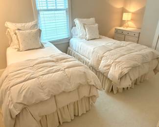 Pair of Twin XL mattresses on Twin frame. Sold with Company store duvet covers, twin sheets, 2 white blankets. 2 Pottery Barn Euros, 2 bedskirts, and 2 throw pillows. Mattresses were originally purchased to be used on client's adjustable bed but used them in guest room instead. Price - $120.00