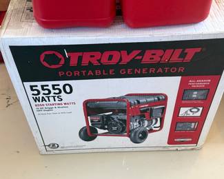 Troy Bilt 5550 watt portable generator with gas cans. New in Box. Never opened. Price-$300.00